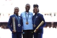 Sha'Carri Richardson (L) , Julien Alfred (C)and Melissa Jefferson (R) with their medals at the Paris Olympics 2024 (Photo by Alex Pantling/Getty Images)